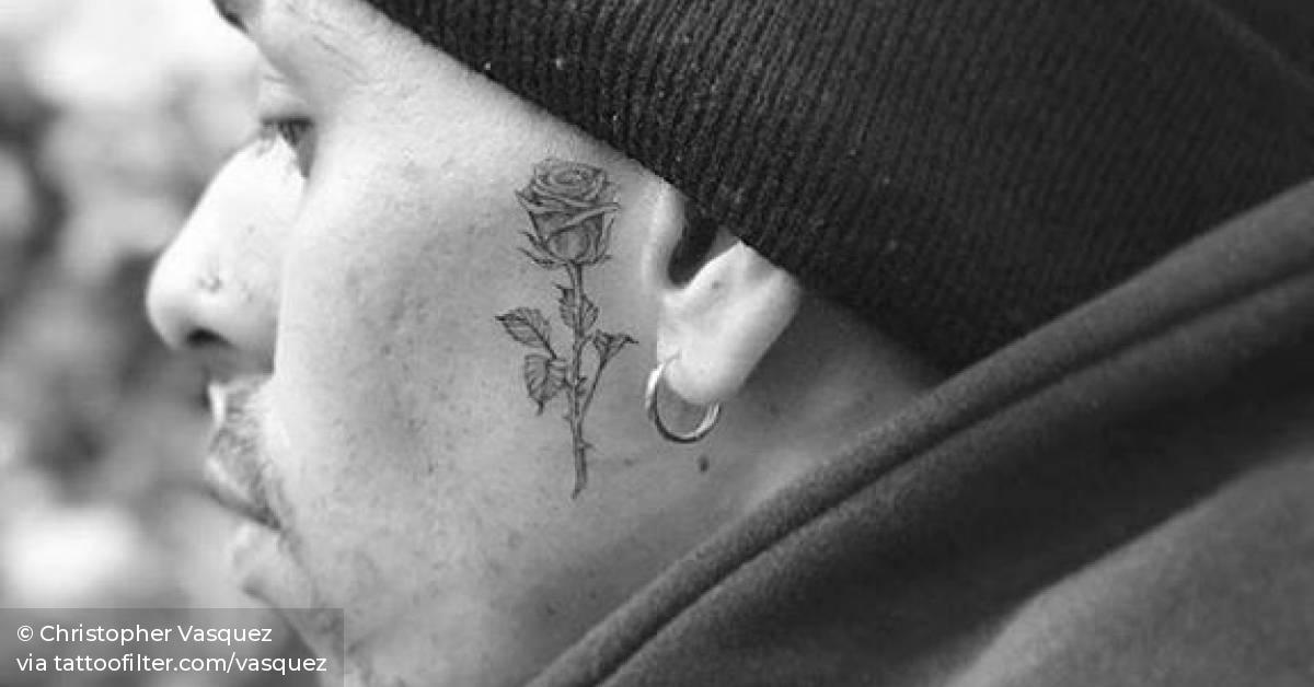 Face rose tattoo