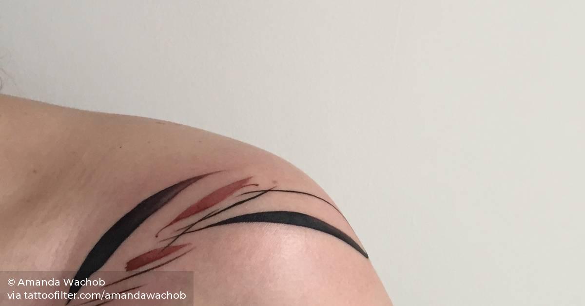 Abstract piece on the left shoulder.