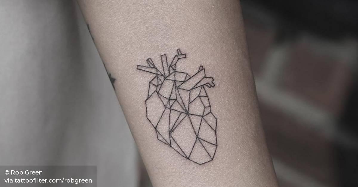 Polygonal anatomical heart tattoo on the left inner