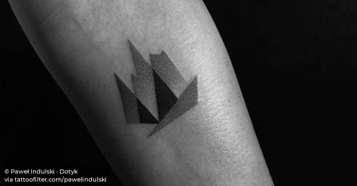 Abstract dotwork piece on the left inner forearm.