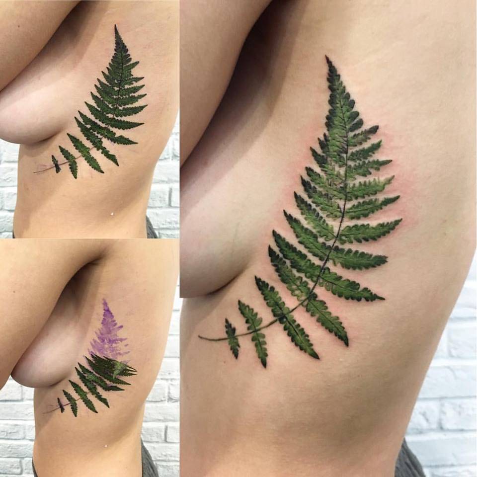 Tattoo feminina no seio