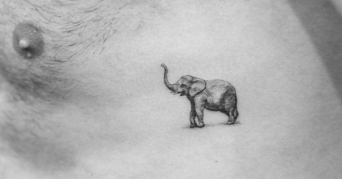 Elephant Rib Tattoo Fine line elephant tattoo on the left side ribcage.