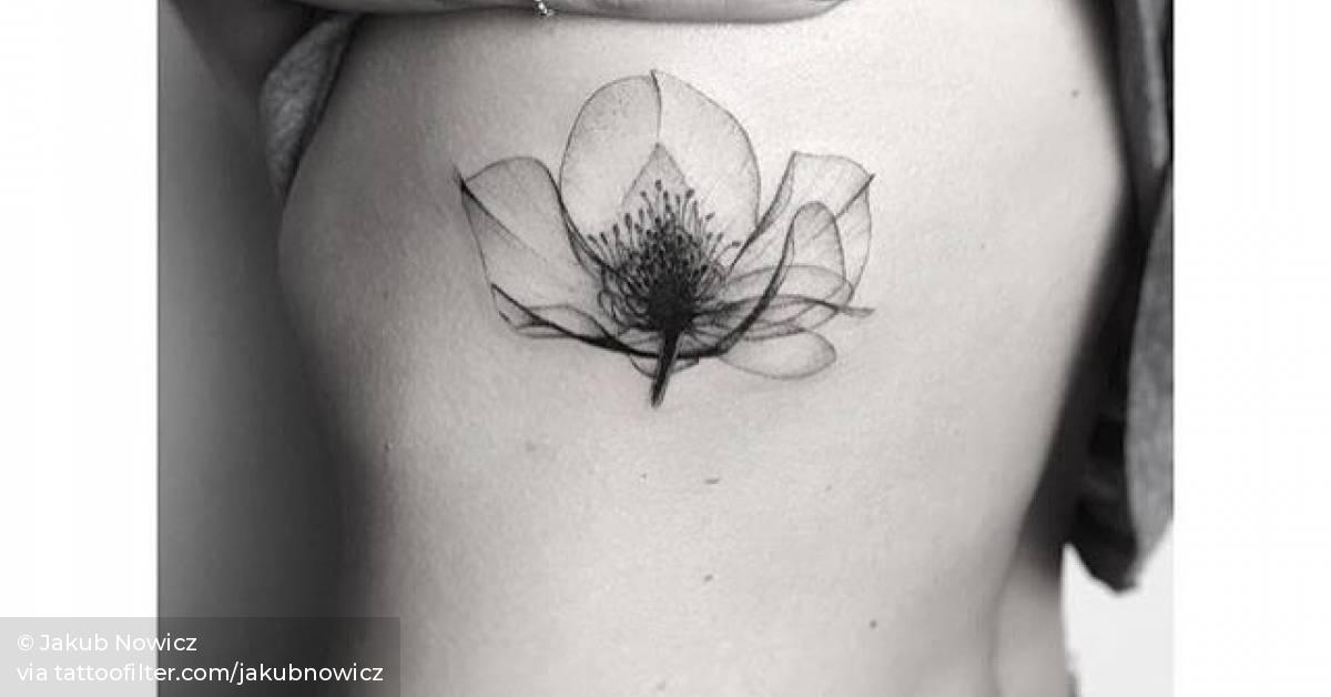 XRay flower tattoo on the left side ribcage.