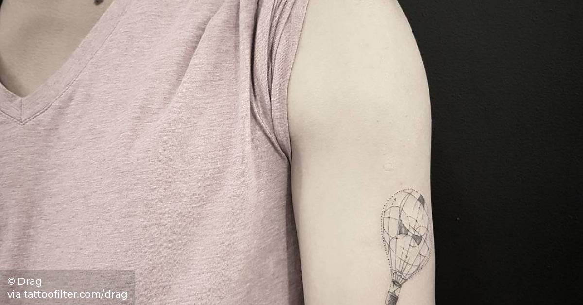 SIngle needle air ballon and anchor tattoo on the left