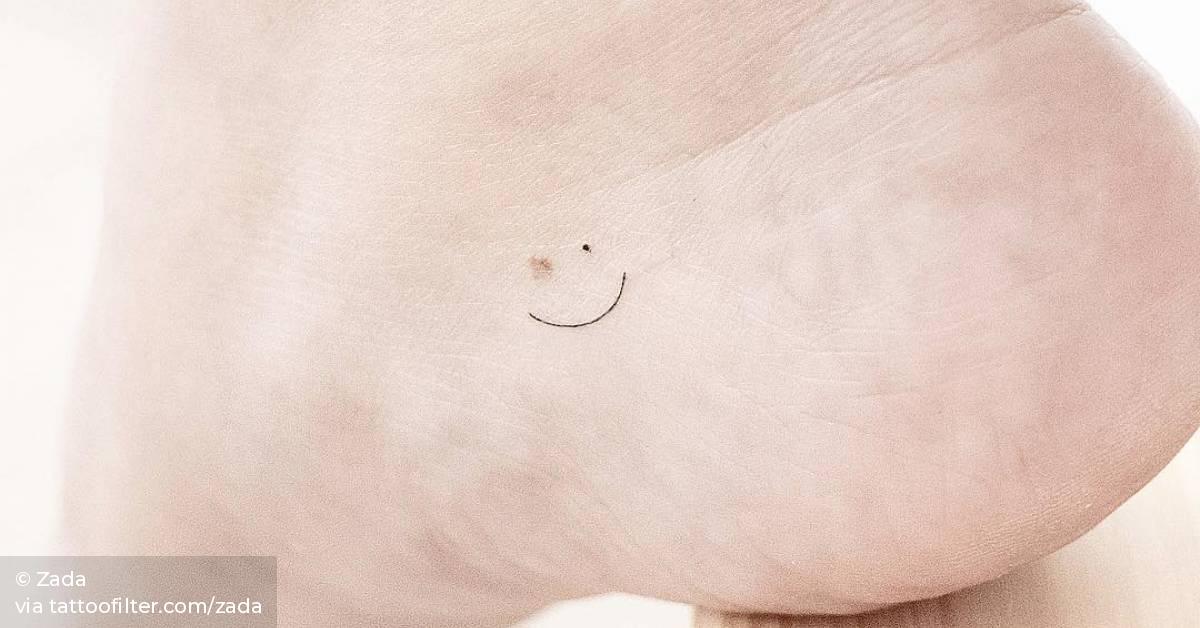 Birthmark smiley tattoo )