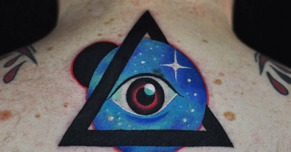 Psychedelic Eye Tattoo On The Upper Back 