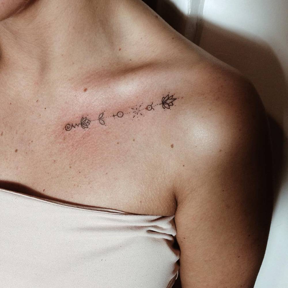 Minimalist Hand Poked Tattoo On The Left Collarbone 