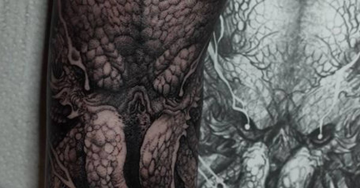 Cthulhu tattoo on the upper arm.