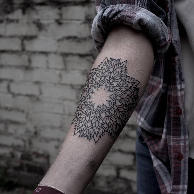 Ornamental Mandala Tattoo On The Inner Forearm 