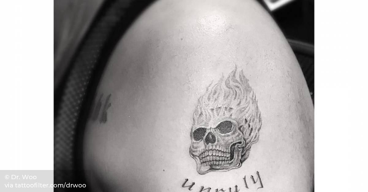 Single Needle Flaming Skull Above The Word unruly 