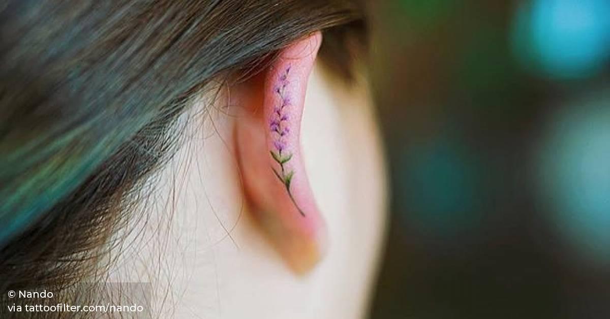 Flower tattoo on the ear.