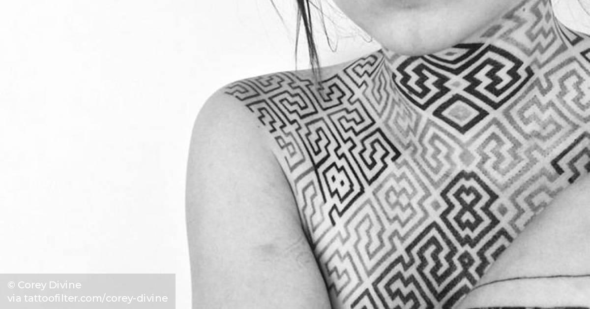Geometric patterns on chest and neck.