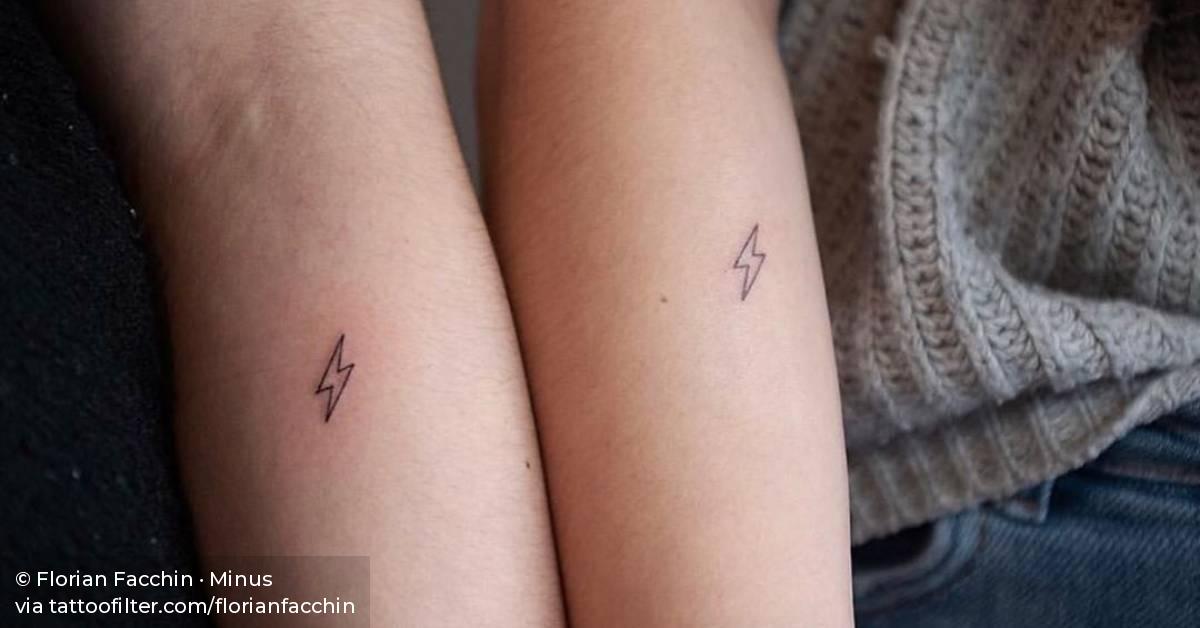 Best friend matching bolt tattoos.