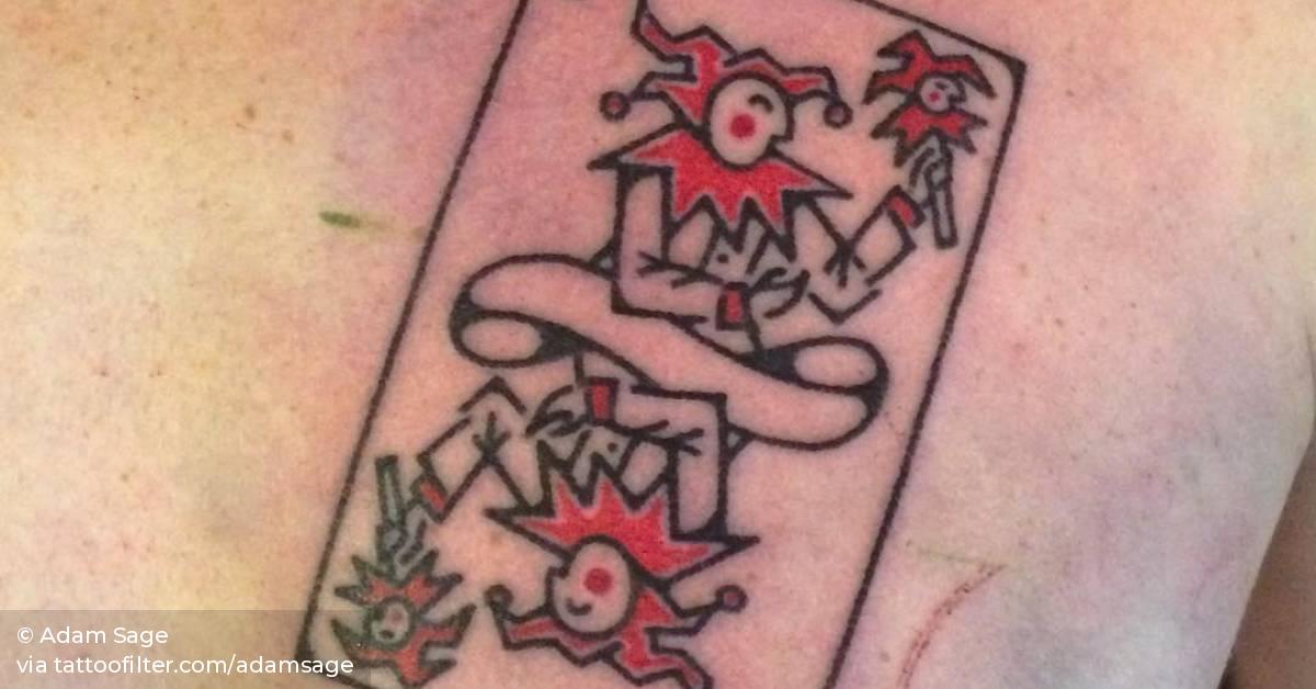 Hand Poked Joker Playing Card Tattoo On The Chest