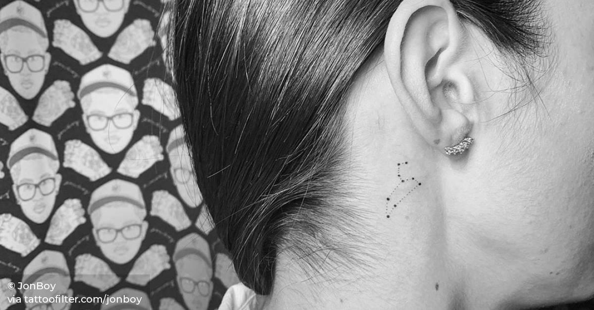 Leo constellation behind the right ear.