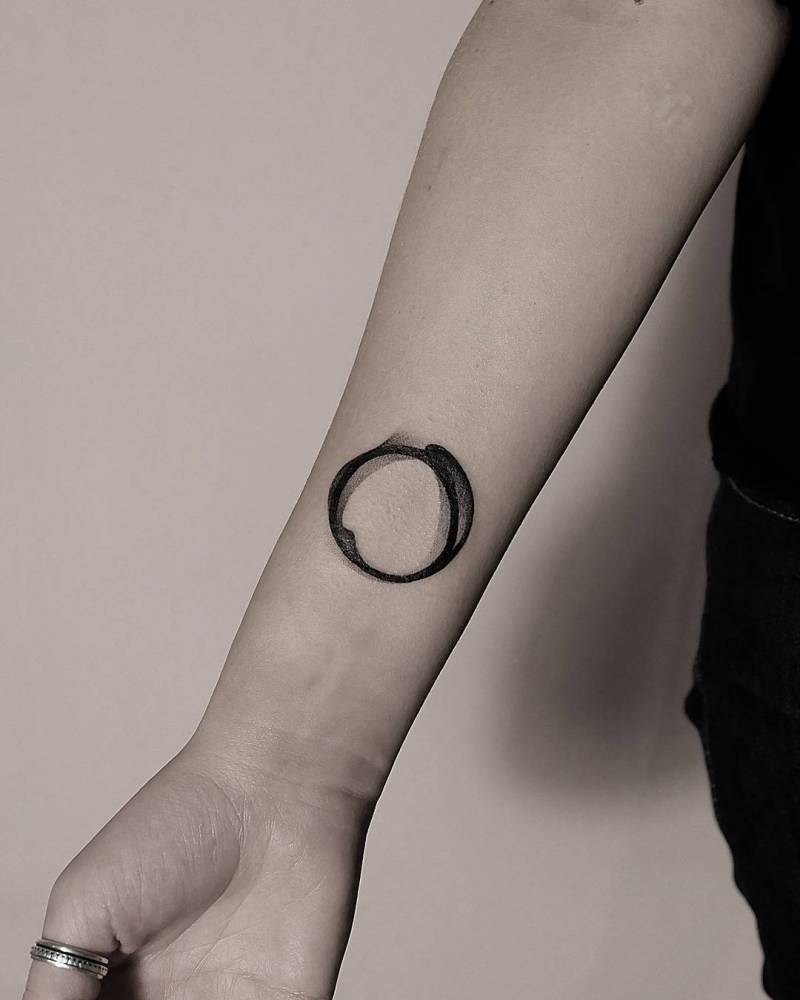 Abstract Circle Tattoo On The Inner Wrist 