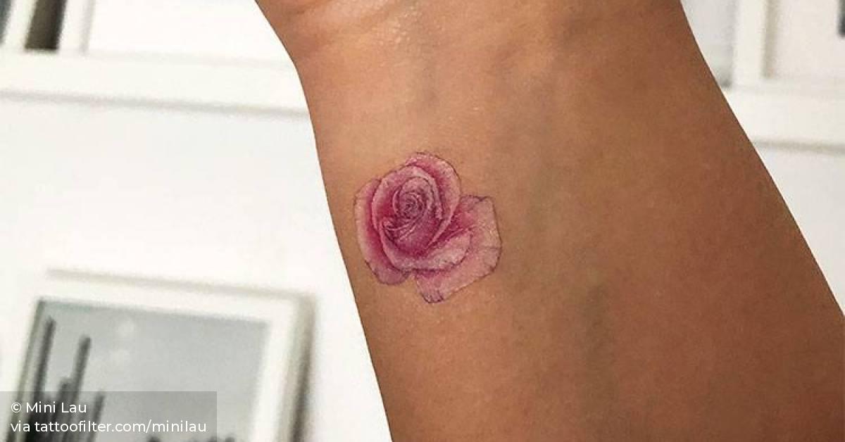 Pink rose temporary tattoo designed by tattoo artist