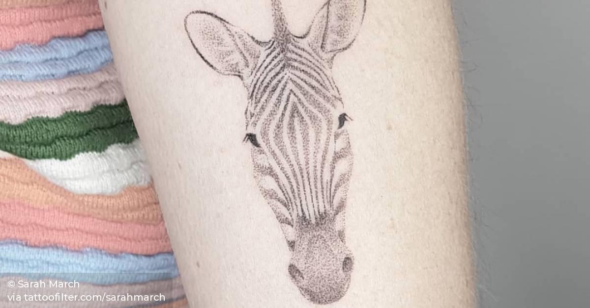 zebra tattoo bleeding through skin
