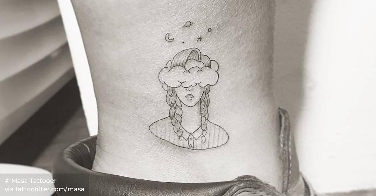 Dreaming girl tattoo on the ankle.