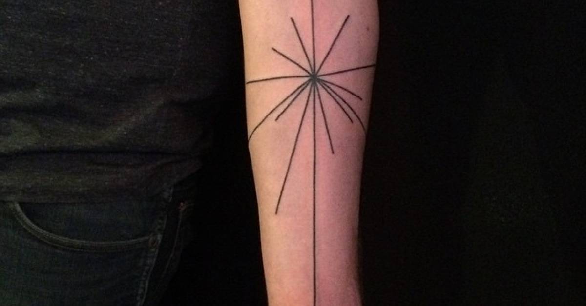 Hand poked pioneer plaque tattoo on the left inner