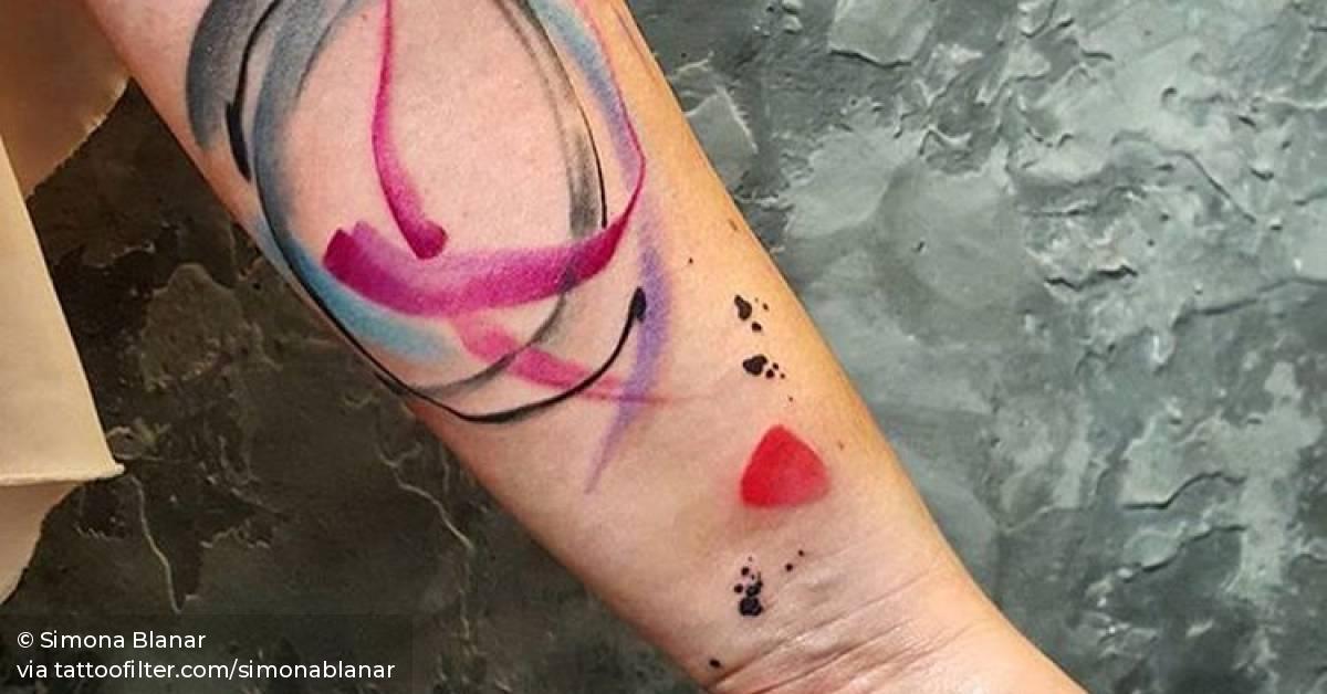 Abstract brush strokes on the left inner forearm.