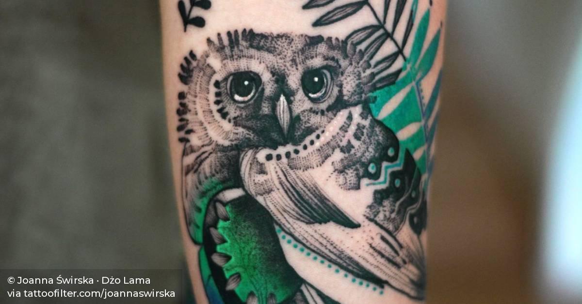 Barn owl tattoo on the left inner forearm.