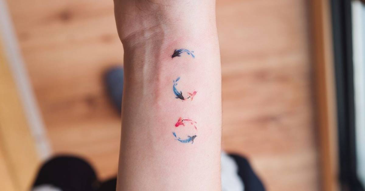 tiny koi fish tattoos on the inner wrist tiny koi fish tattoos on the inner wrist