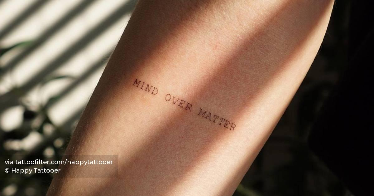 "Mind over matter" - Lettering tattoo on inner forearm