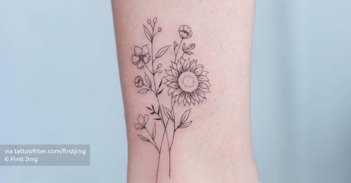 Fine line flower bouquet tattoo on the ankle