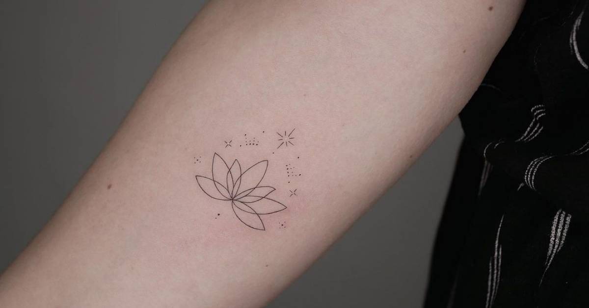 Lotus flower tattoo in fine line