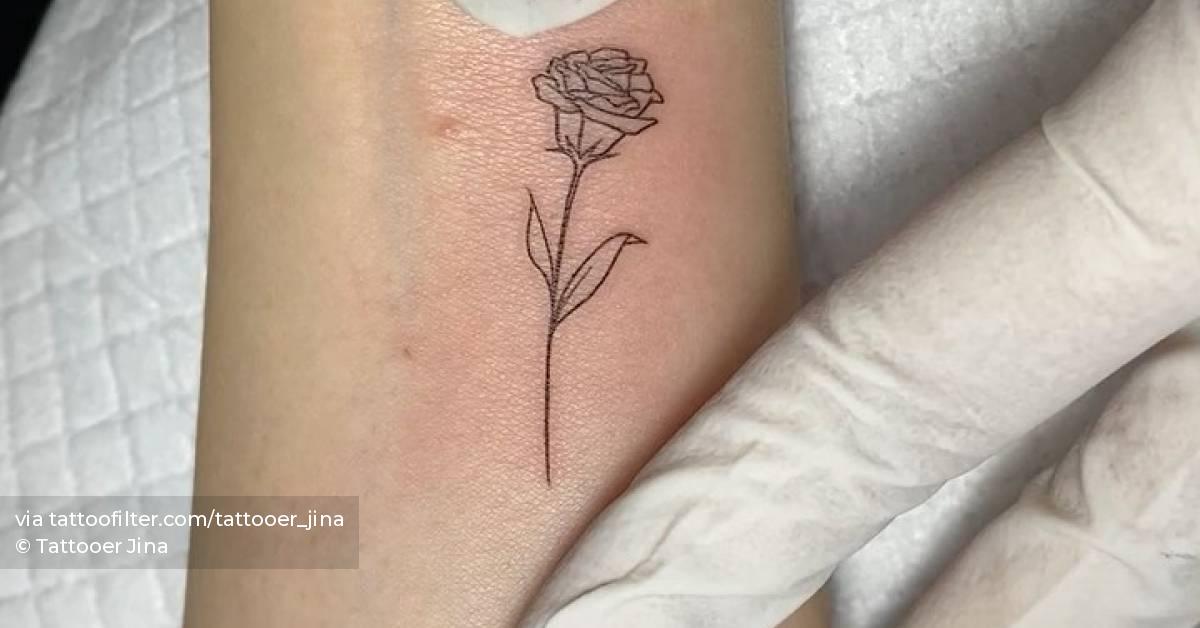 Fine Line Rose Tattoo On The Wrist
