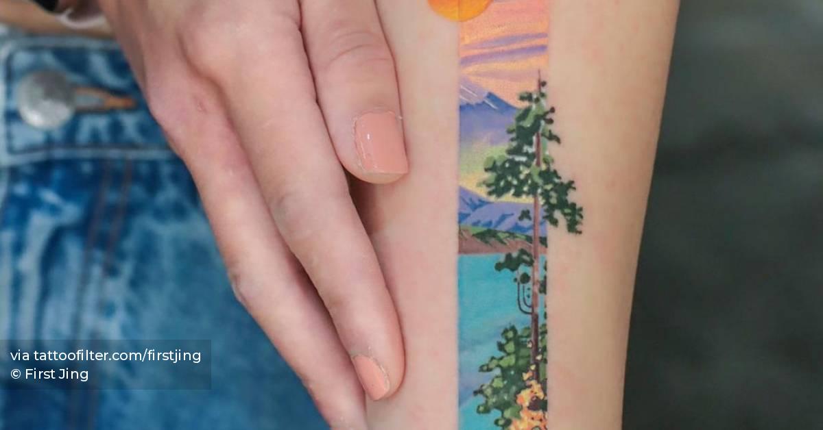 Landscape tattoo on the inner forearm