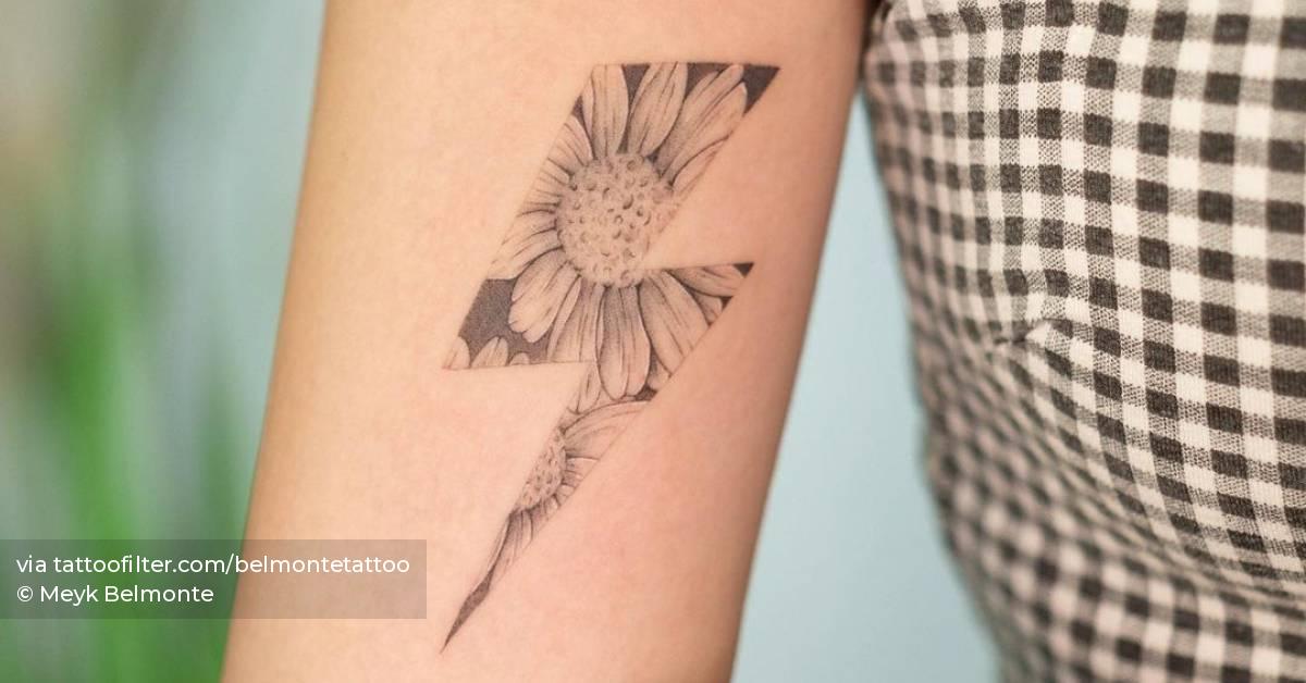 Lightning bolt sunflower tattoo on the inner arm