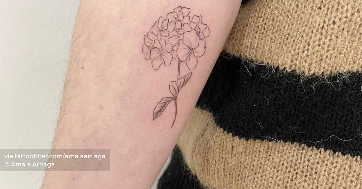 Fine line hydrangea tattoo on the inner forearm