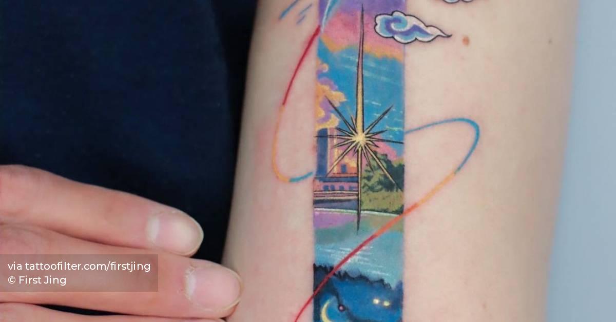 Landscape tattoo on the bicep.