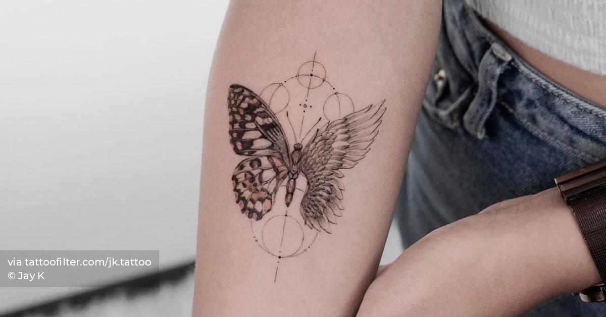 Single needle butterfly with an angel wing tattoo
