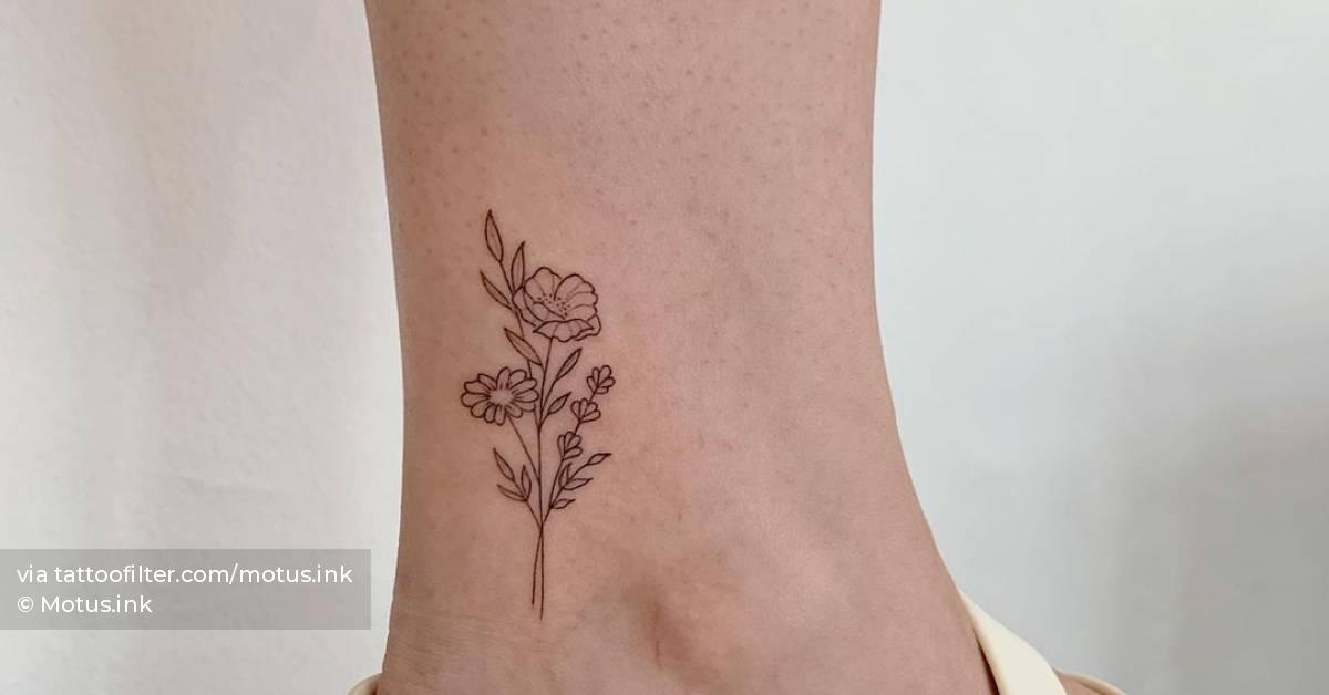 Fine line flower bouquet tattoo on the ankle.