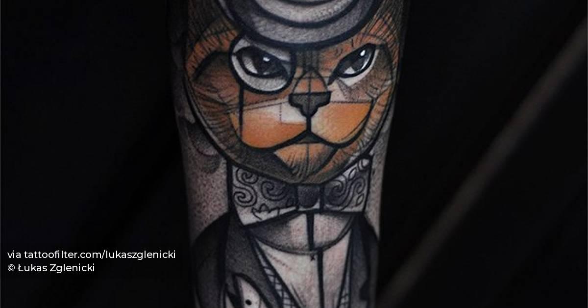 Sketch work Dandy cat tattoo on the inner forearm.