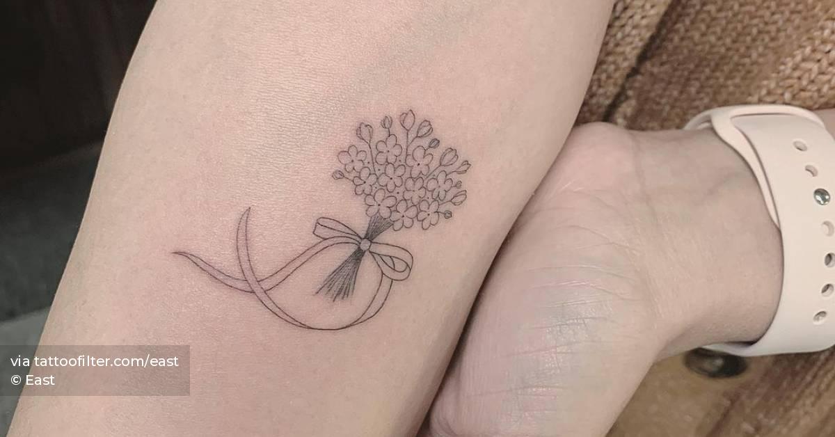 Single needle flower bouquet tattoo on the inner