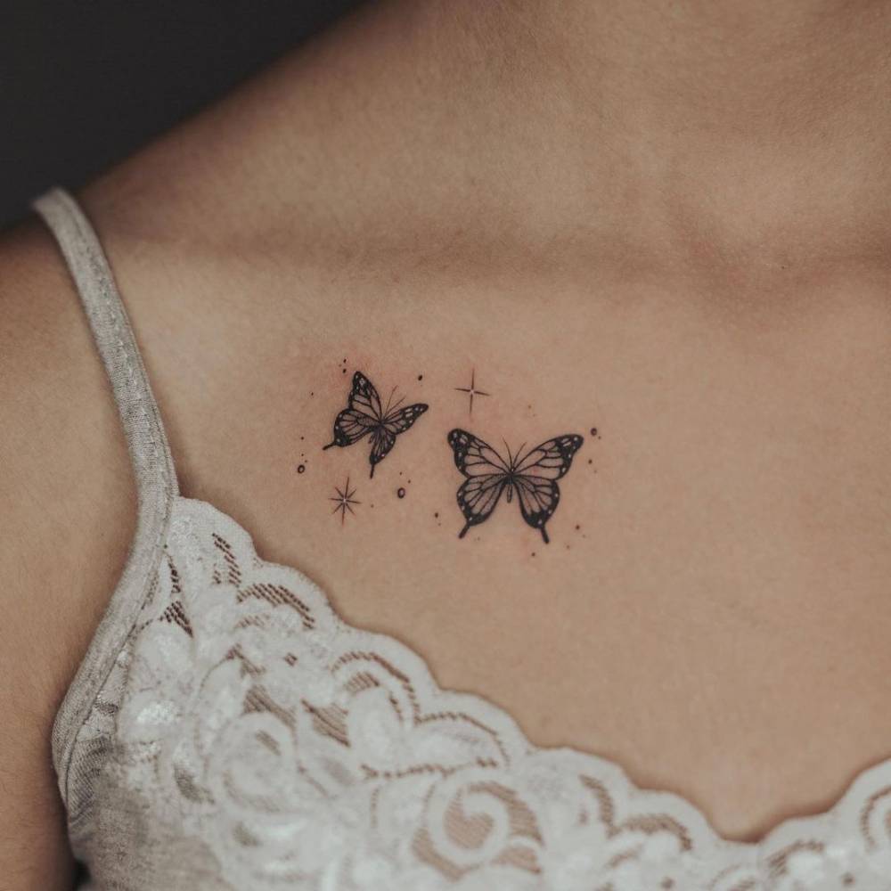 Fine Line Butterflies Tattoo On The Collarbone 