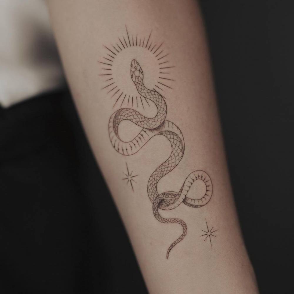 Fine Line Snake Tattoo On The Forearm 