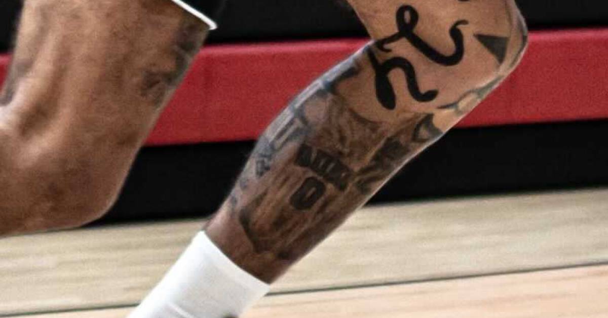 Black mamba shaped as the number 24 tattooed on Jayson
