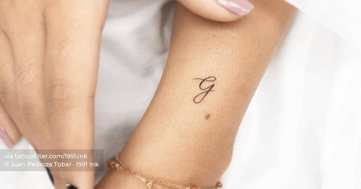 Cursive Letter G Tattoo