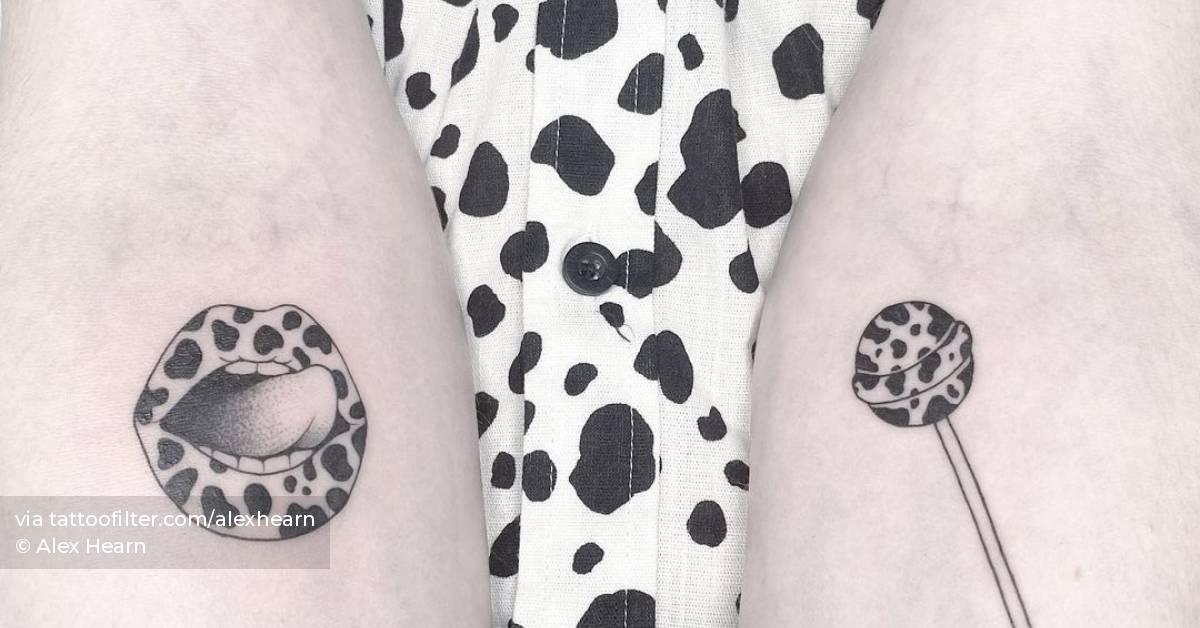 Individual matching mouth and lollipop tattoo on the