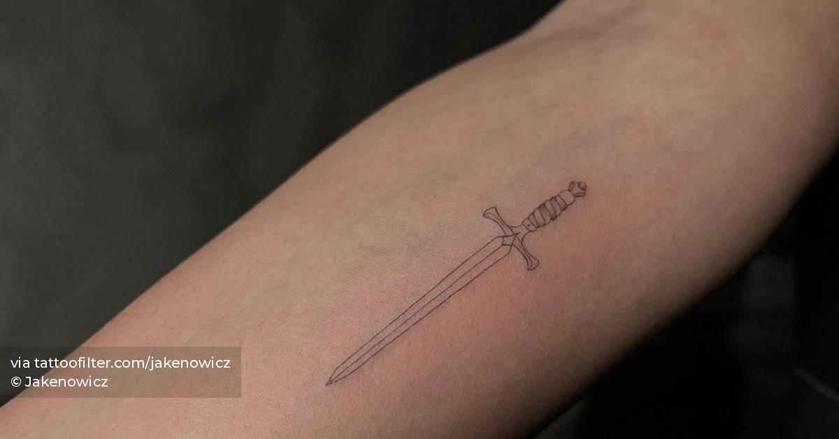 Single needle sword tattoo on the inner forearm.