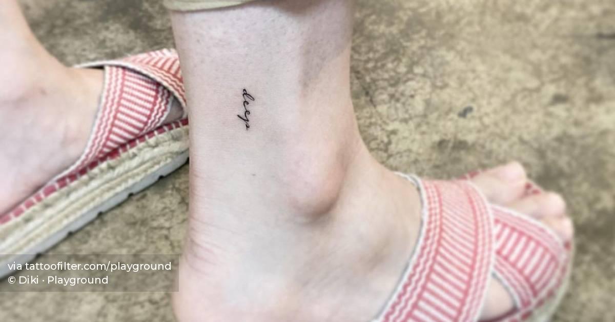 "Deep" lettering tattoo on the ankle.