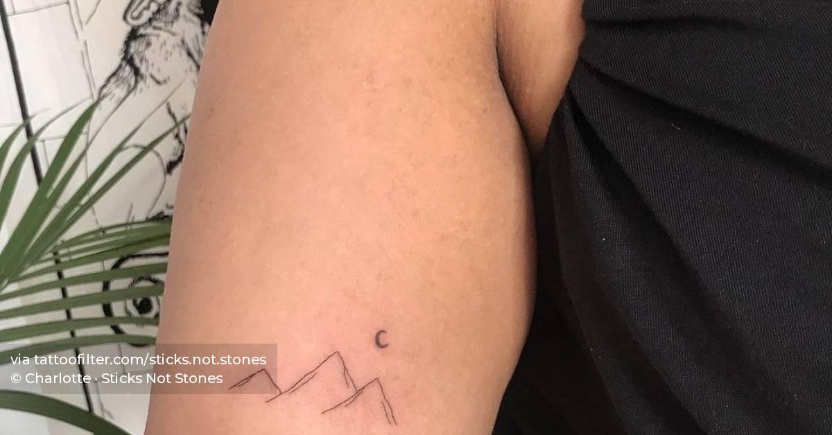 Cute little mountains tattoo hand poked on the inner