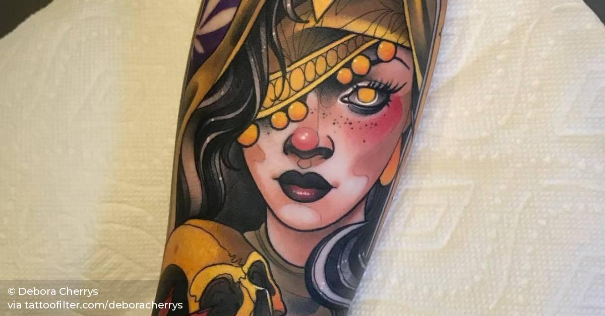 Fortune teller tattoo on the inner forearm.