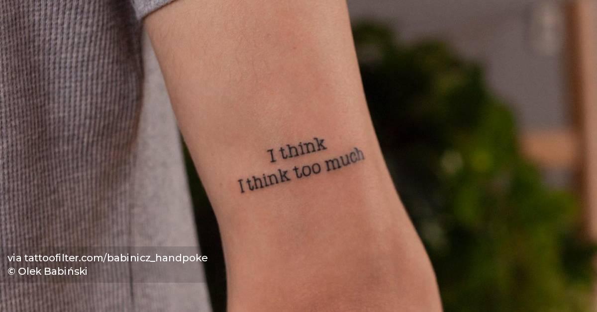 "I think I think too much" lettering tattoo located on