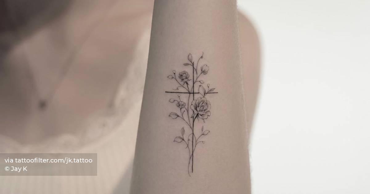 Floral Cross Tattoo on the Forearm